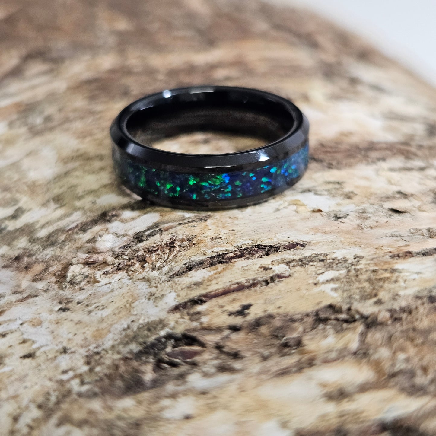 Tungsten carbibe with natural emerald opal.