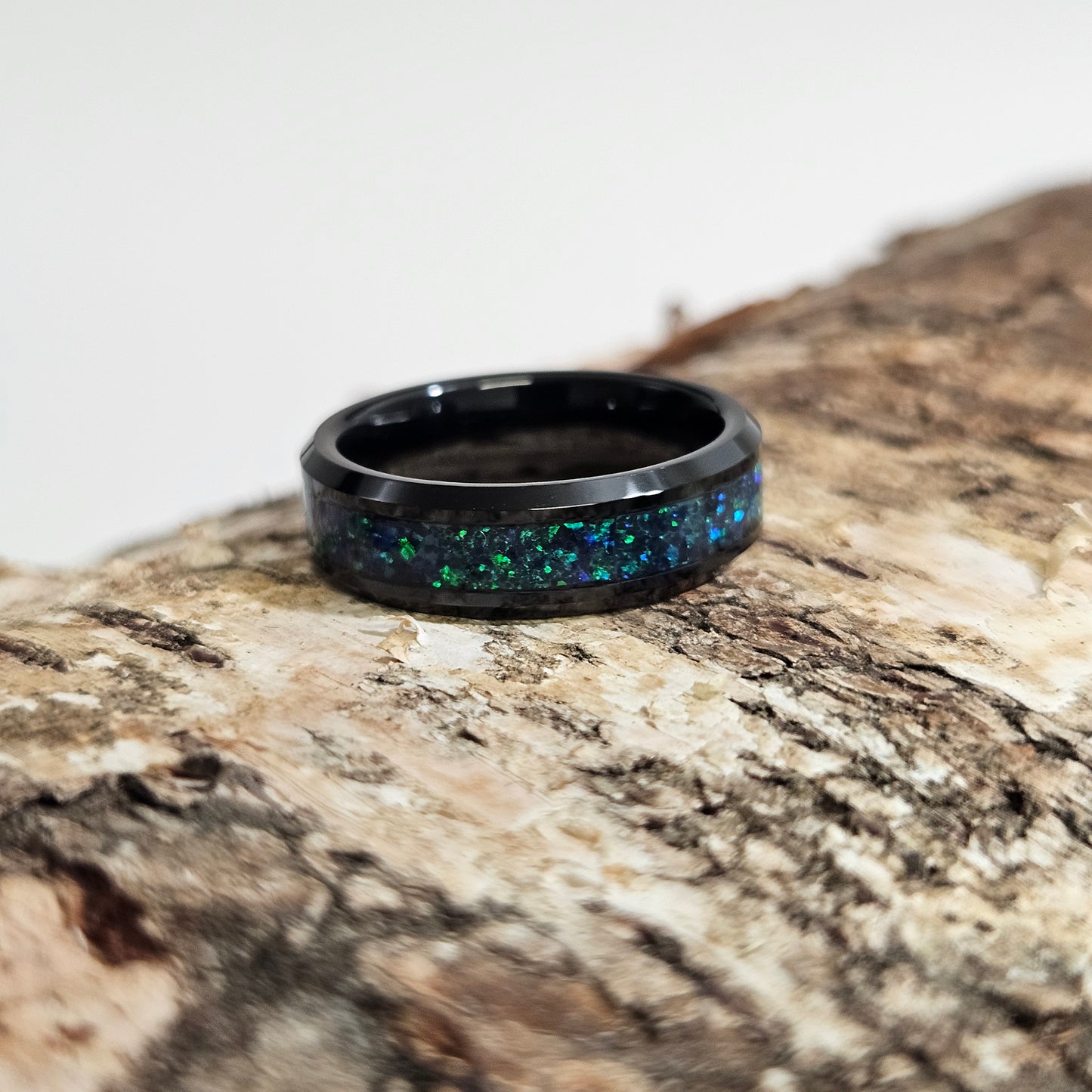 Tungsten carbibe with natural emerald opal.