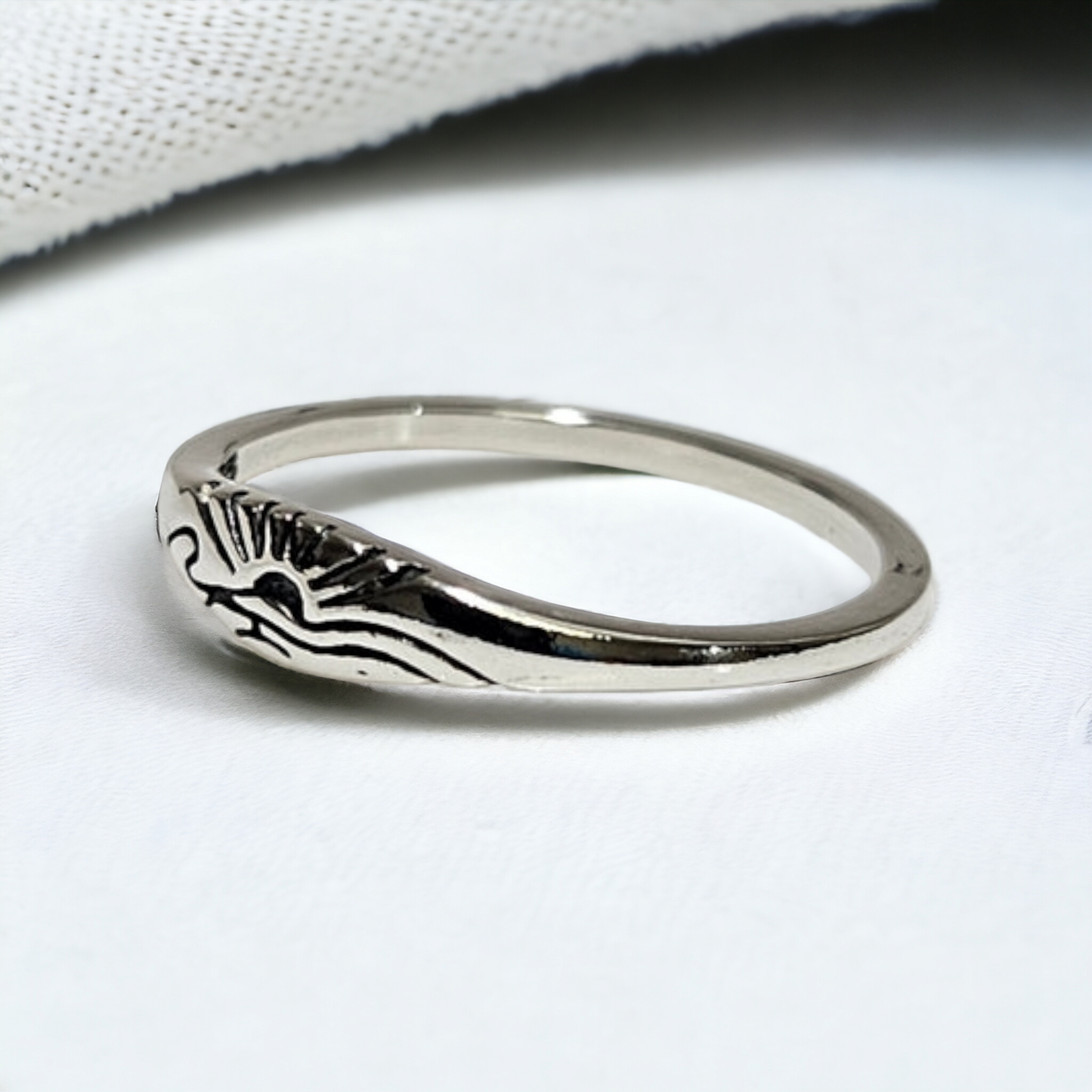 sunset over ocean laser cut silver ring