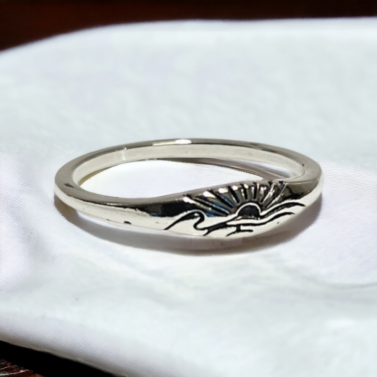 sunset over ocean laser cut silver ring